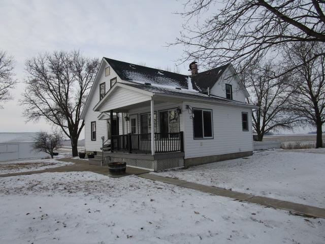 bungalow-style house featuring a chimney