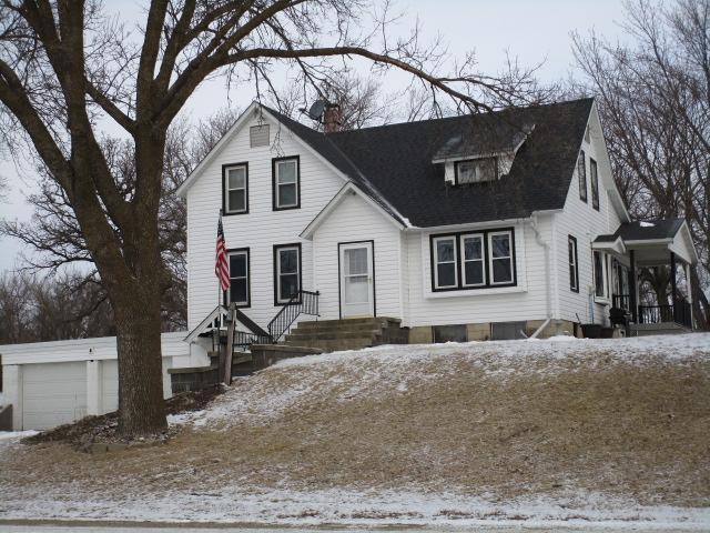 view of front of property featuring a chimney