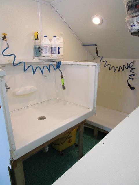 bathroom featuring vaulted ceiling