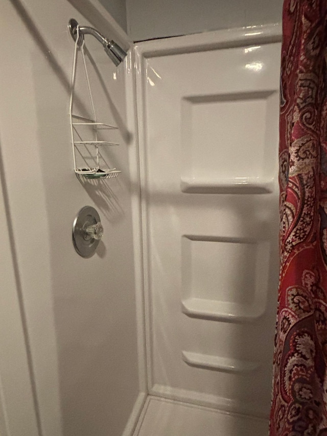 bathroom with a stall shower