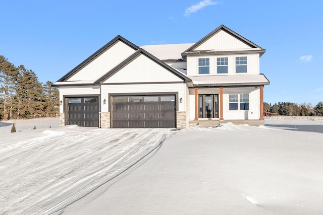 modern farmhouse featuring an attached garage