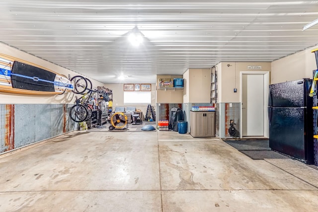 garage featuring freestanding refrigerator