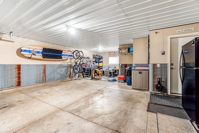 garage featuring freestanding refrigerator