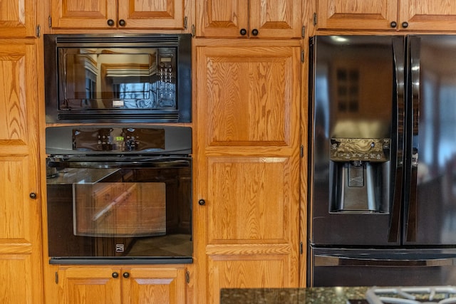 kitchen with black appliances