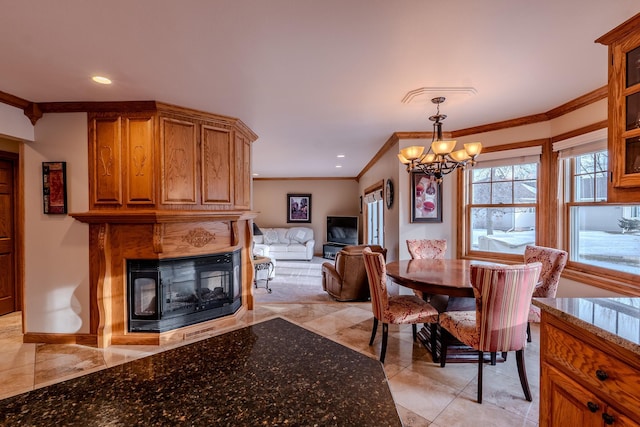 dining area with a notable chandelier, light tile patterned floors, recessed lighting, ornamental molding, and a multi sided fireplace