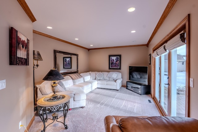 carpeted living area featuring ornamental molding, recessed lighting, visible vents, and baseboards