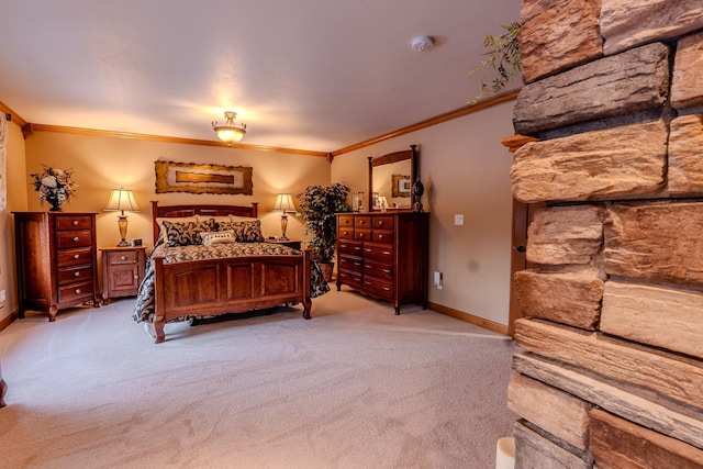 bedroom featuring light colored carpet, crown molding, and baseboards