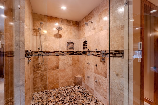 bathroom featuring a stall shower