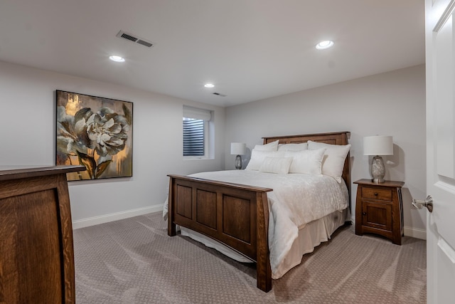 bedroom featuring baseboards, recessed lighting, visible vents, and light colored carpet