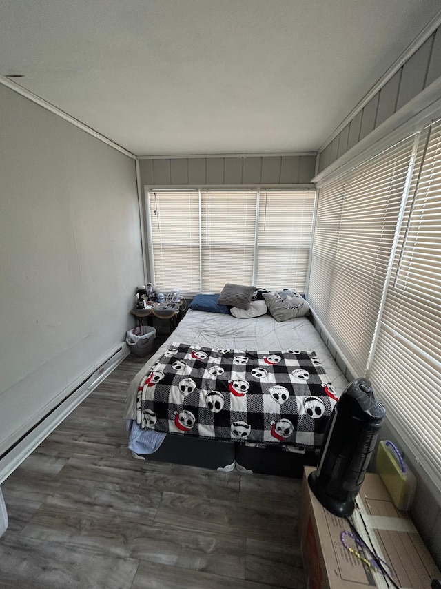 bedroom with wood finished floors