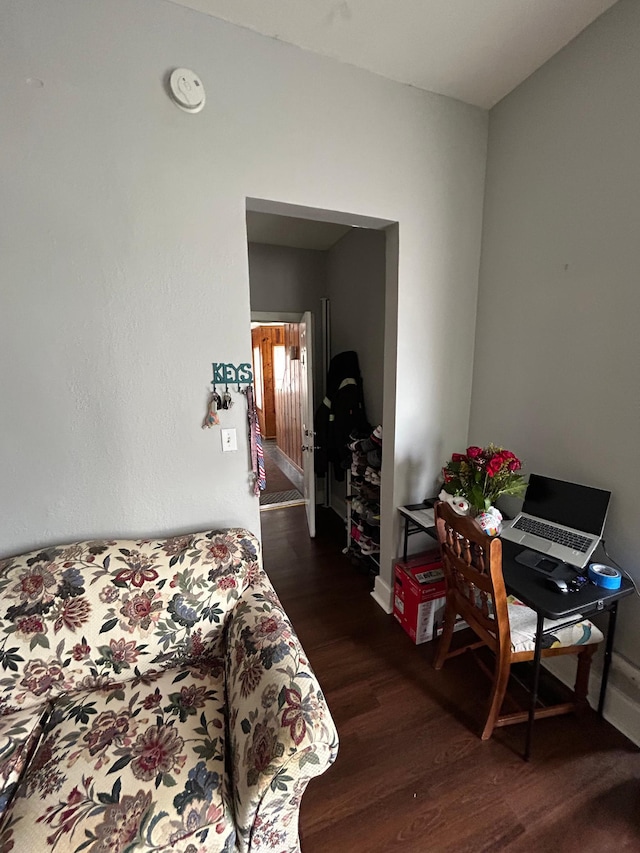 bedroom with wood finished floors