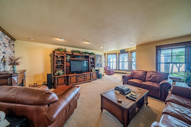 living area featuring light carpet and a textured ceiling