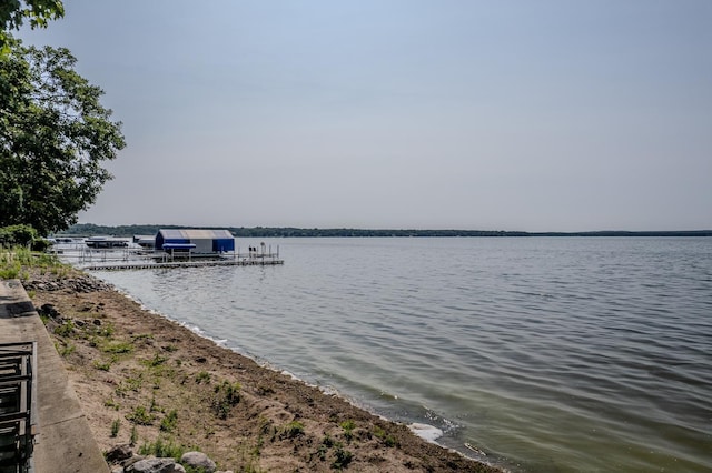 view of water feature with a boat dock and boat lift