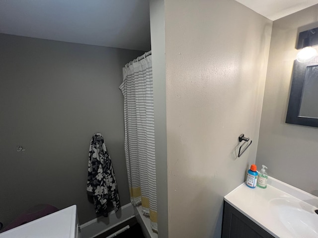 bathroom with vanity and a shower with curtain