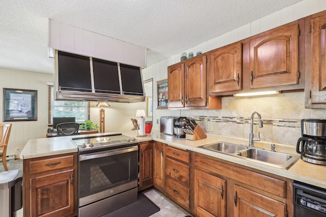 kitchen with light countertops, a sink, electric range, and dishwasher