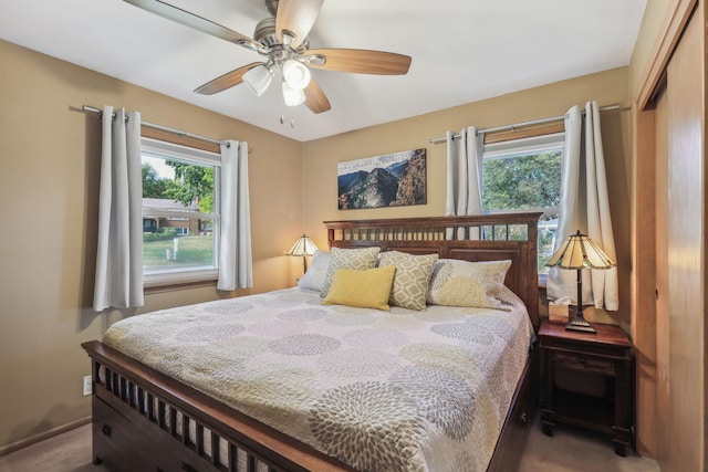 bedroom featuring baseboards and a ceiling fan