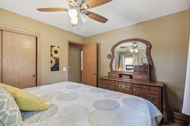 bedroom featuring ceiling fan and a closet