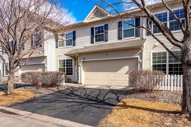 view of front of property with driveway and an attached garage