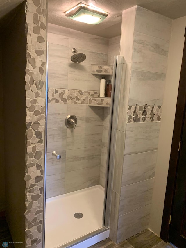 full bathroom featuring a stall shower