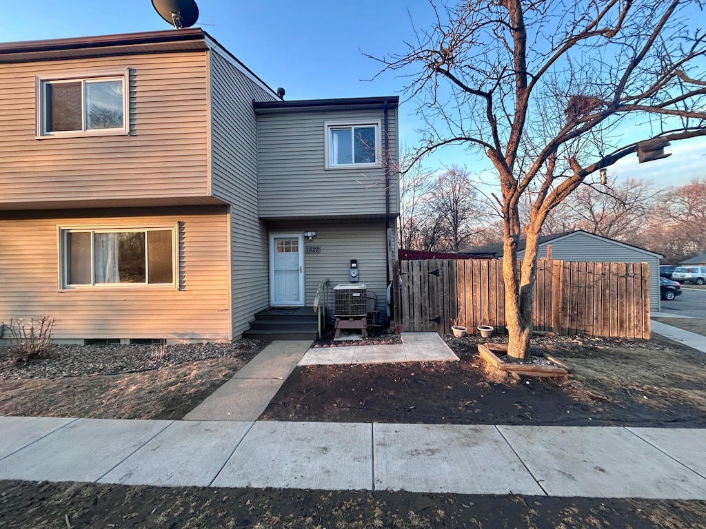 view of front of house with fence