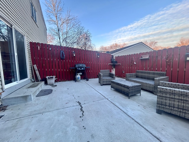 view of patio / terrace with fence, grilling area, and an outdoor hangout area