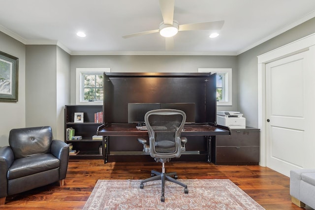 home office with wood finished floors, plenty of natural light, and a ceiling fan