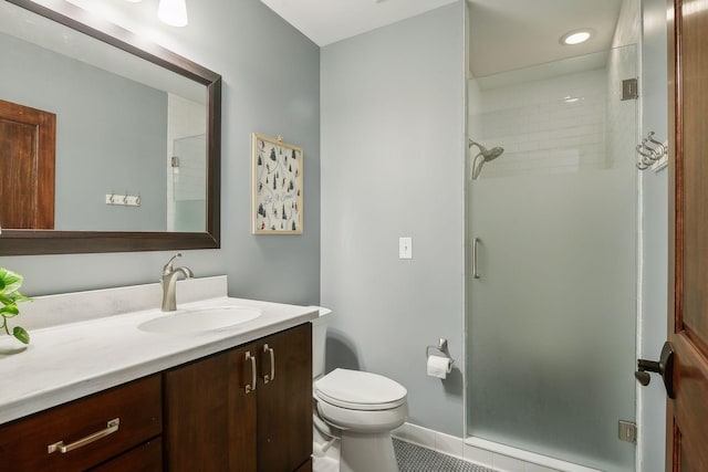 full bathroom featuring recessed lighting, tile patterned floors, a shower stall, toilet, and vanity
