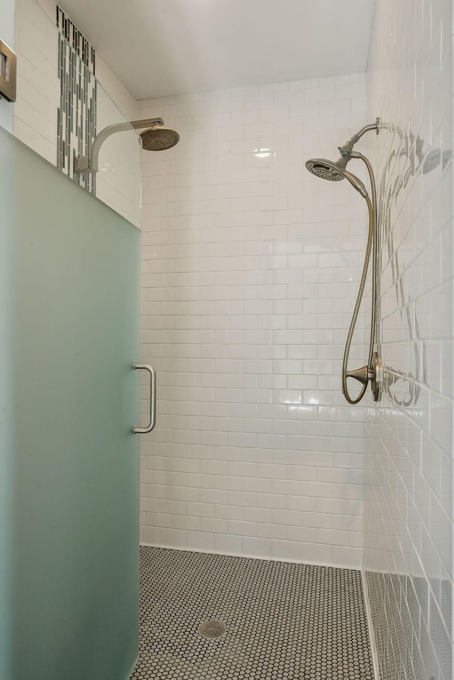 bathroom featuring a shower stall