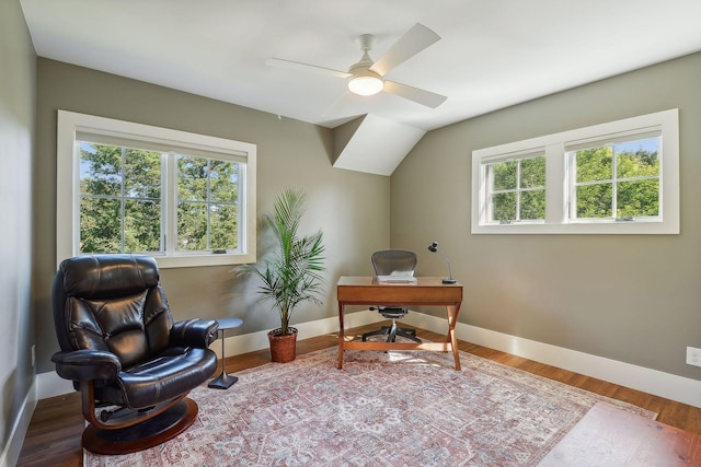 home office with baseboards, wood finished floors, and a healthy amount of sunlight