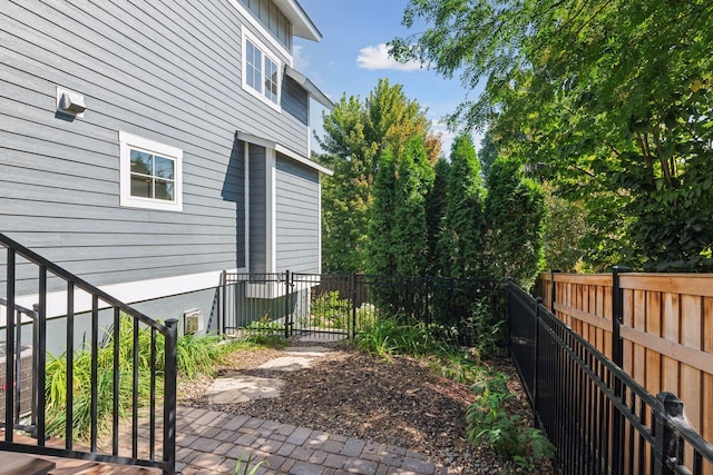 view of property exterior featuring a fenced backyard