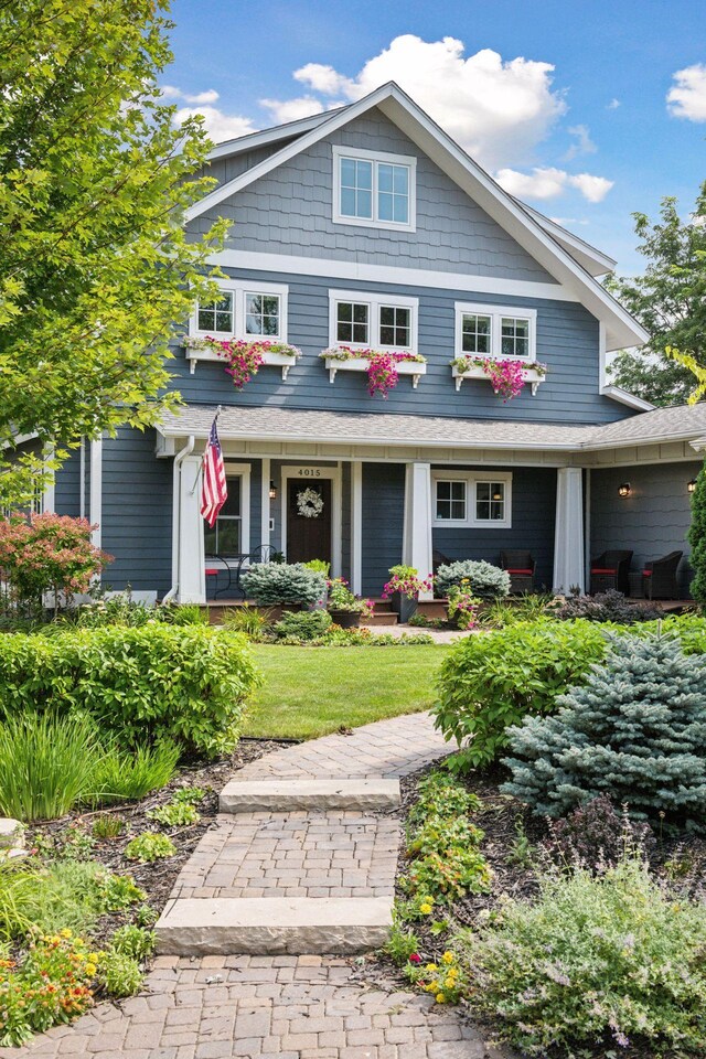 4015 Wood End Dr, Edina, MN 55424 - view of front facade featuring a porch