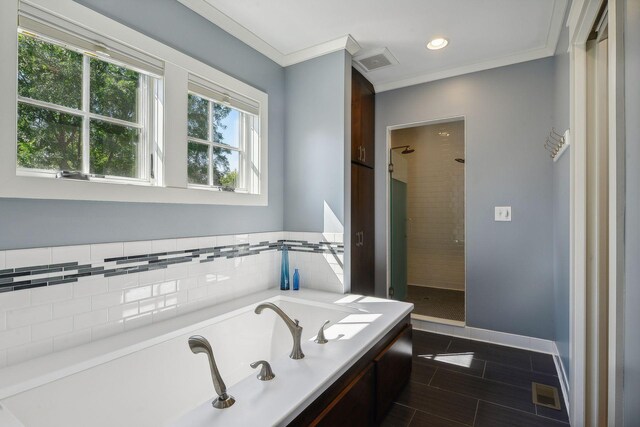 4015 Wood End Dr, Edina, MN 55424 - bathroom with a stall shower, a jetted tub, ornamental molding, recessed lighting, and baseboards