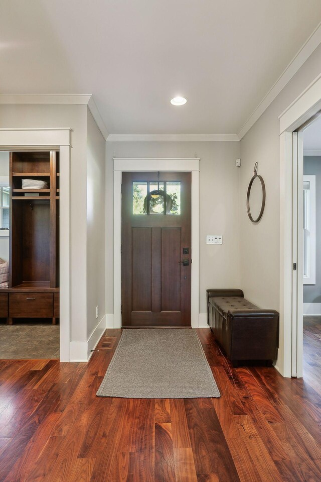 4015 Wood End Dr, Edina, MN 55424 - foyer featuring crown molding, wood finished floors, baseboards, and recessed lighting