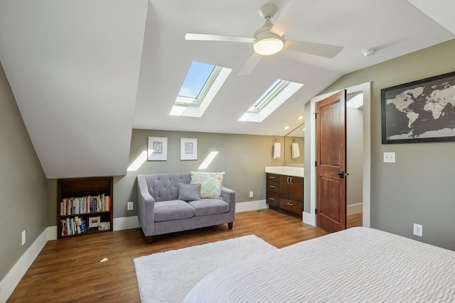 4015 Wood End Dr, Edina, MN 55424 - bedroom with a skylight, wood finished floors, lofted ceiling, ceiling fan, and baseboards