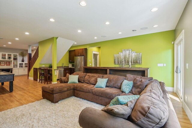 4015 Wood End Dr, Edina, MN 55424 - living room featuring recessed lighting, light wood finished floors, baseboards, and stairs