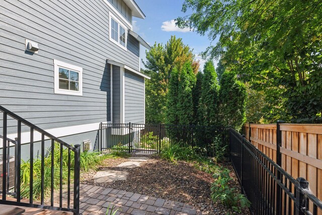 4015 Wood End Dr, Edina, MN 55424 - view of property exterior featuring a fenced backyard