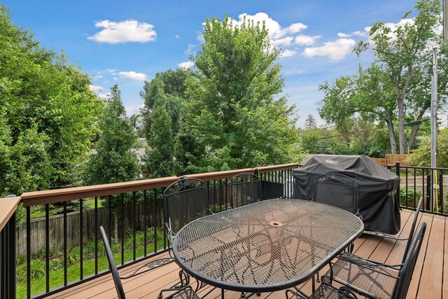 4015 Wood End Dr, Edina, MN 55424 - deck featuring outdoor dining space and a grill