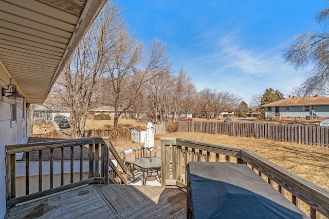 deck featuring outdoor dining space and fence