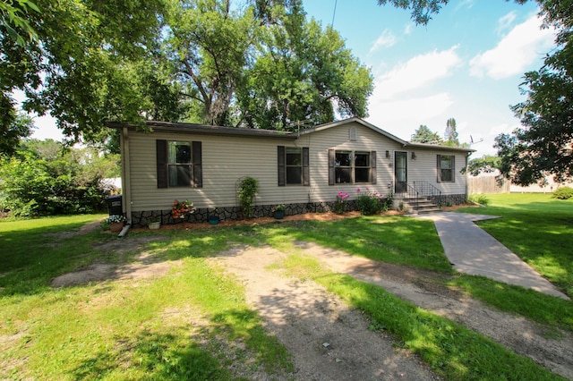 view of front of home with a front yard