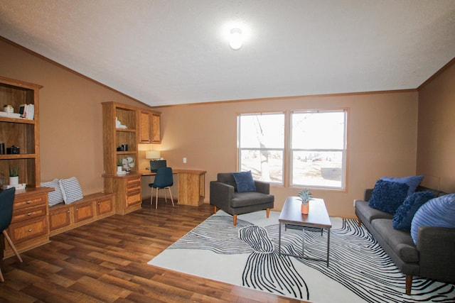 living area with lofted ceiling, built in desk, dark wood-style floors, and ornamental molding