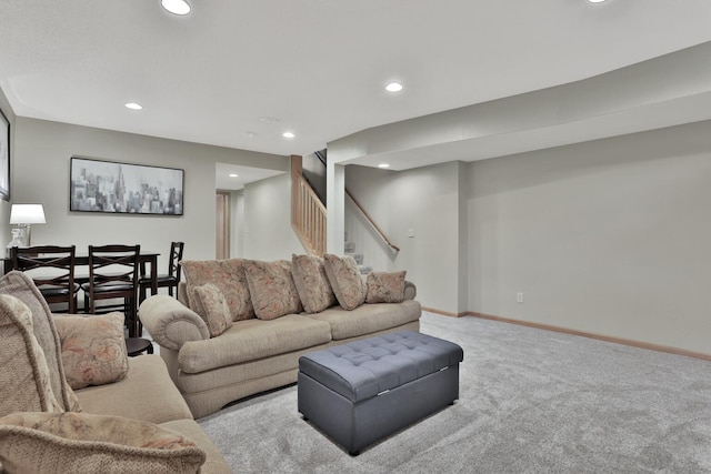 living area with carpet floors, stairway, recessed lighting, and baseboards