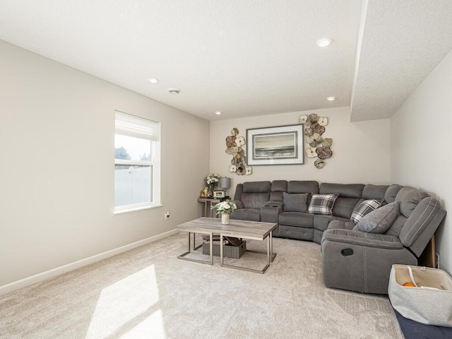 living room with carpet flooring, recessed lighting, and baseboards