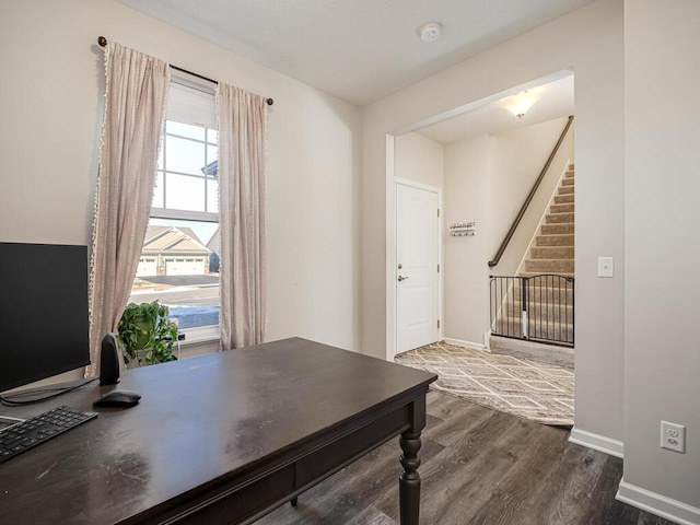 office area featuring wood finished floors and baseboards