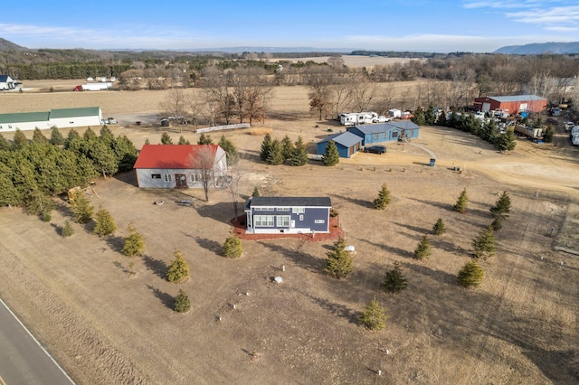 aerial view featuring a rural view and a mountain view