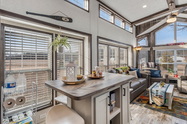 sunroom / solarium with beam ceiling