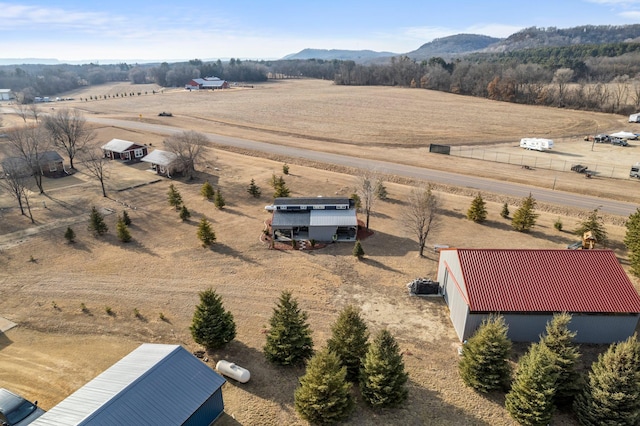 aerial view with a mountain view and a rural view