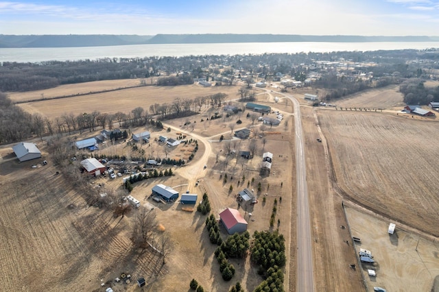 drone / aerial view with a rural view and a water view