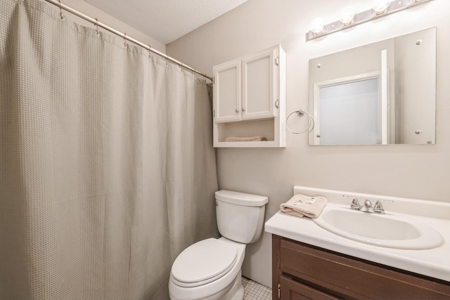 full bath with toilet and vanity