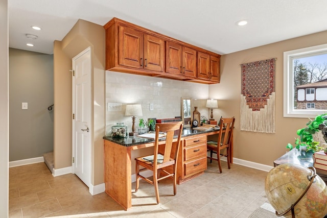 office space featuring light tile patterned floors, recessed lighting, and baseboards