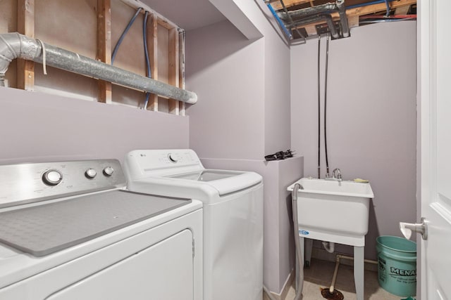 washroom with laundry area and separate washer and dryer